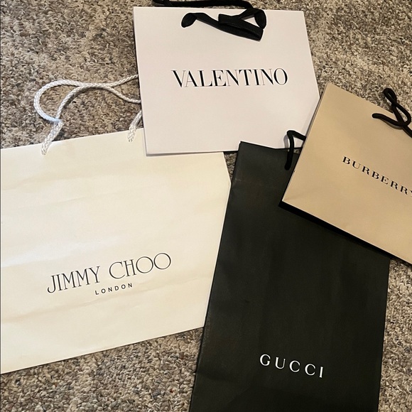 Assortment of designer paper shopping bags. - Picture 2 of 2